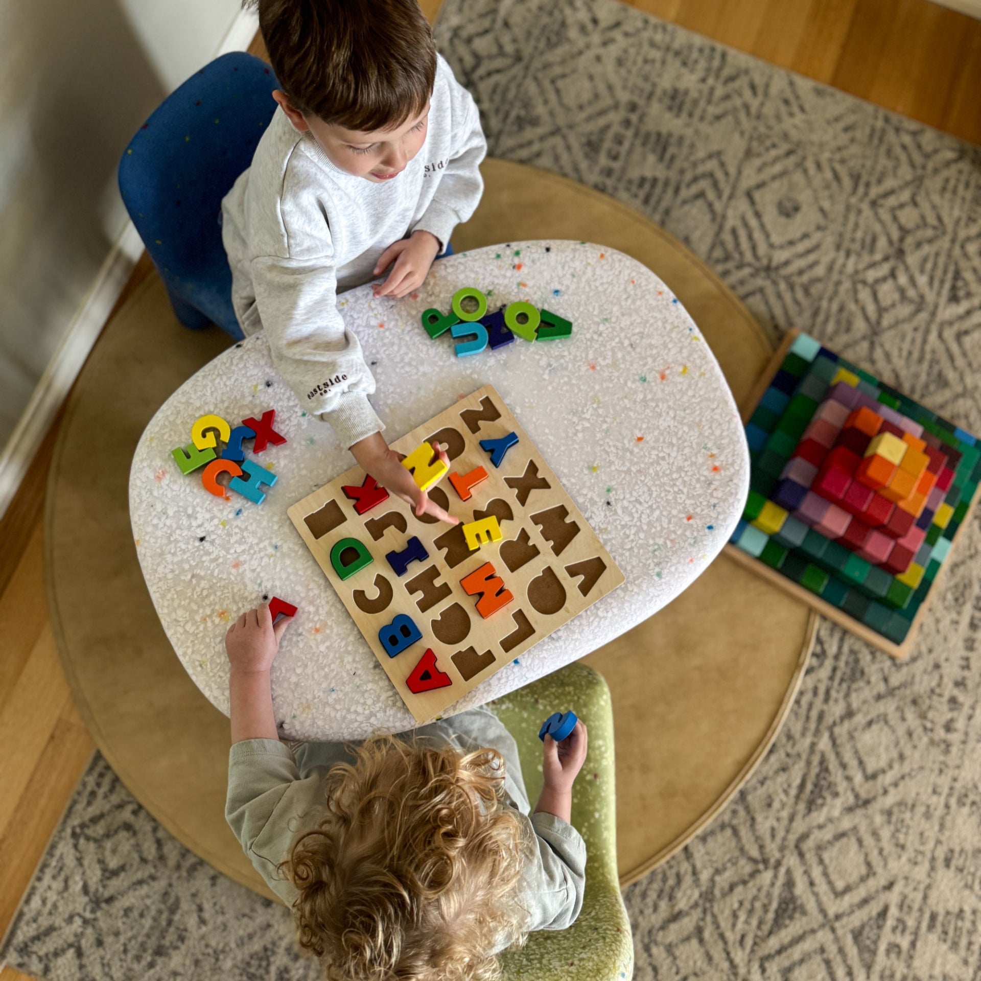 Confetti set ocean matcha Chairs two boys playing colourful blocks, wooden alphabet toy