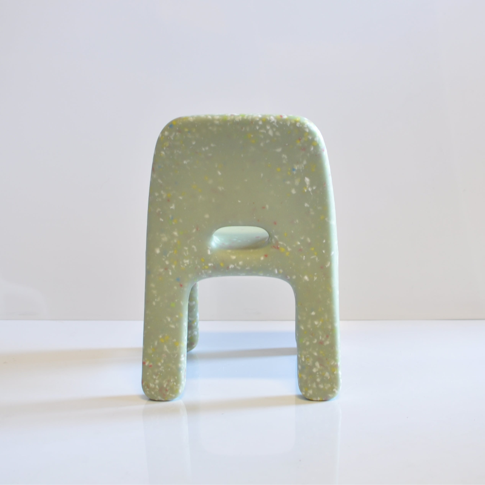 Green confetti kids chair on a white background