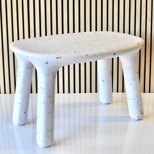 speckles kids white confetti table angled view with veneer background