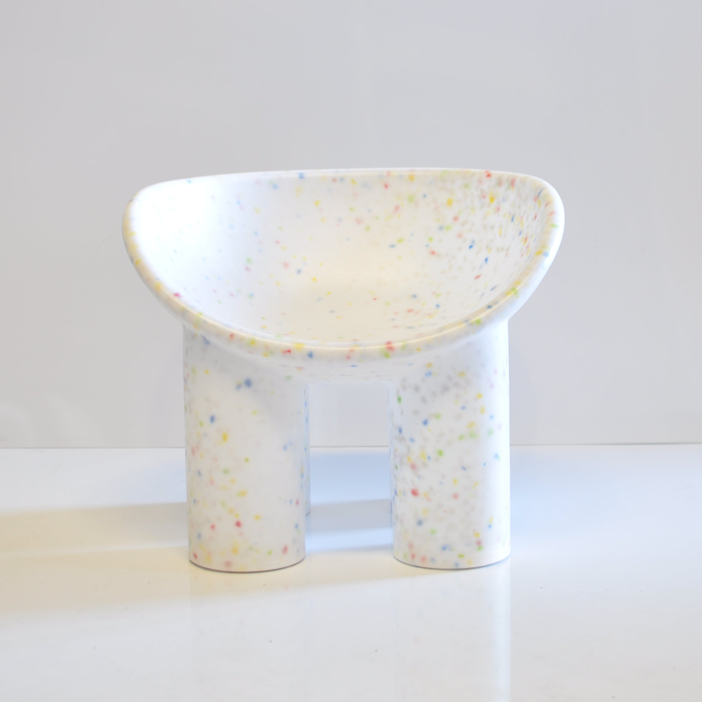 white confetti kids roly poly chair with textured surface on a white background