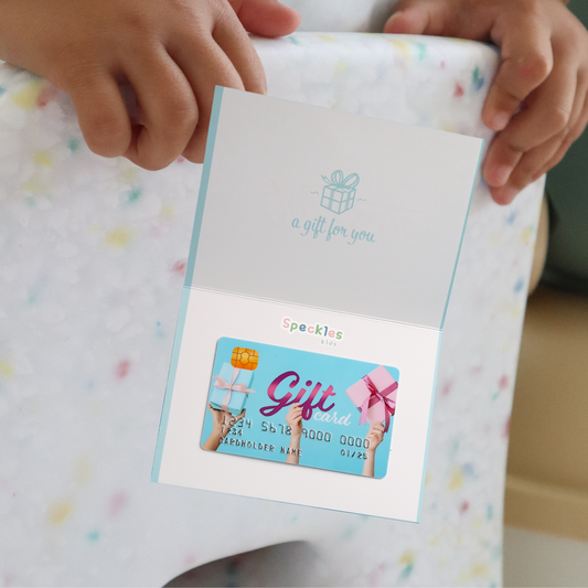 Speckles kids Giftcard on a confetti pattern background