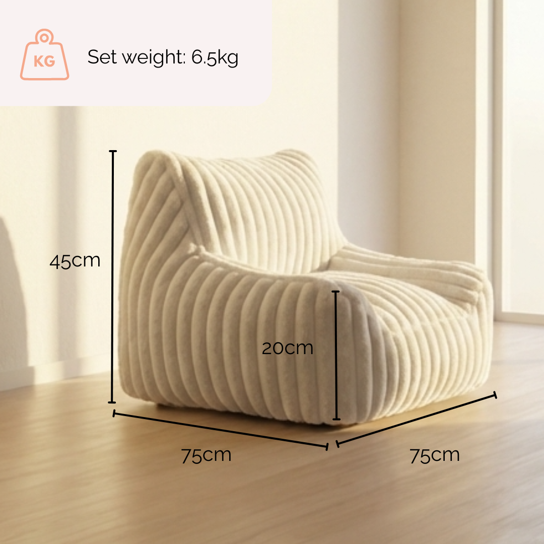 Beige kids couch with dimensions labeled in a kids room.