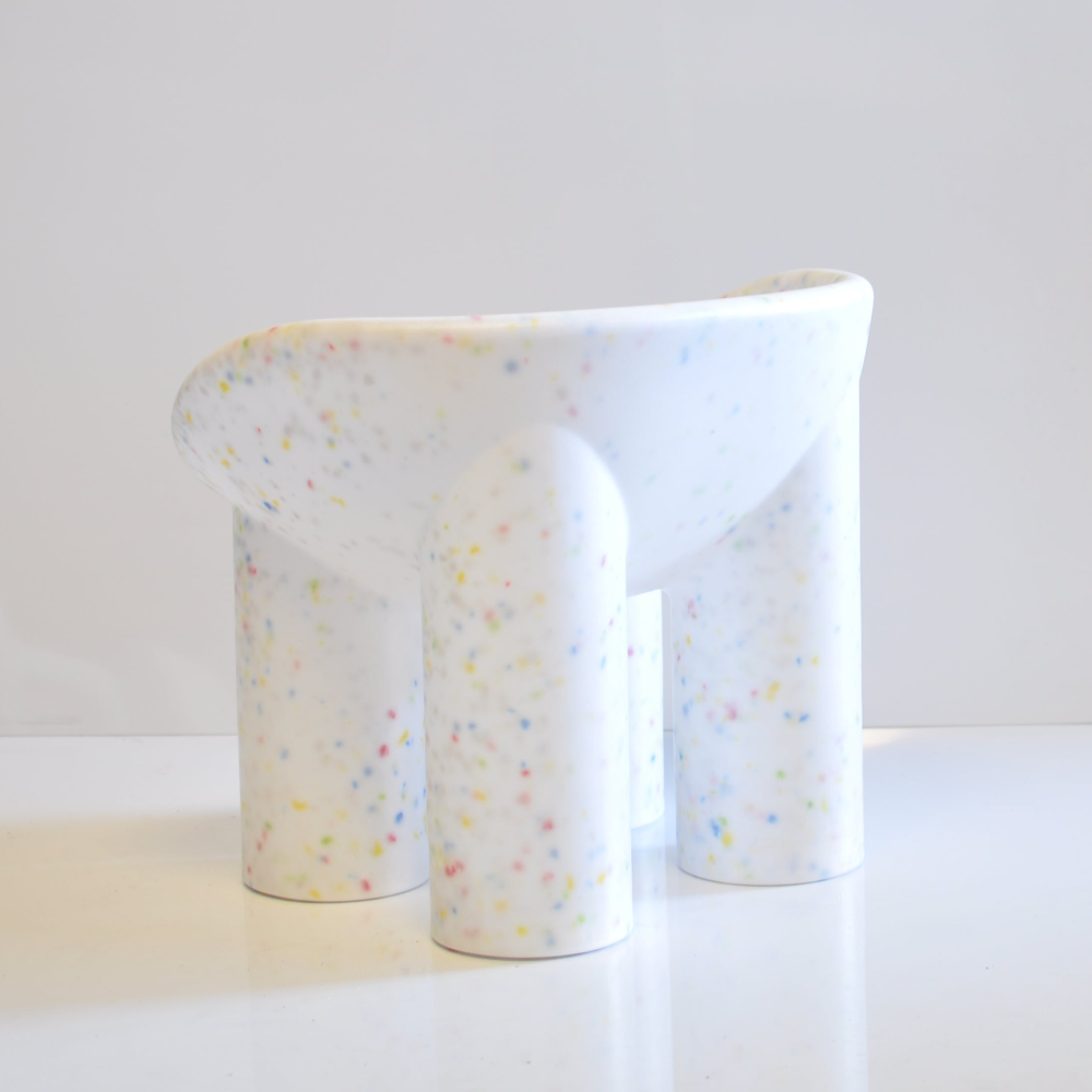 white confetti kids roly poly chair on a white background