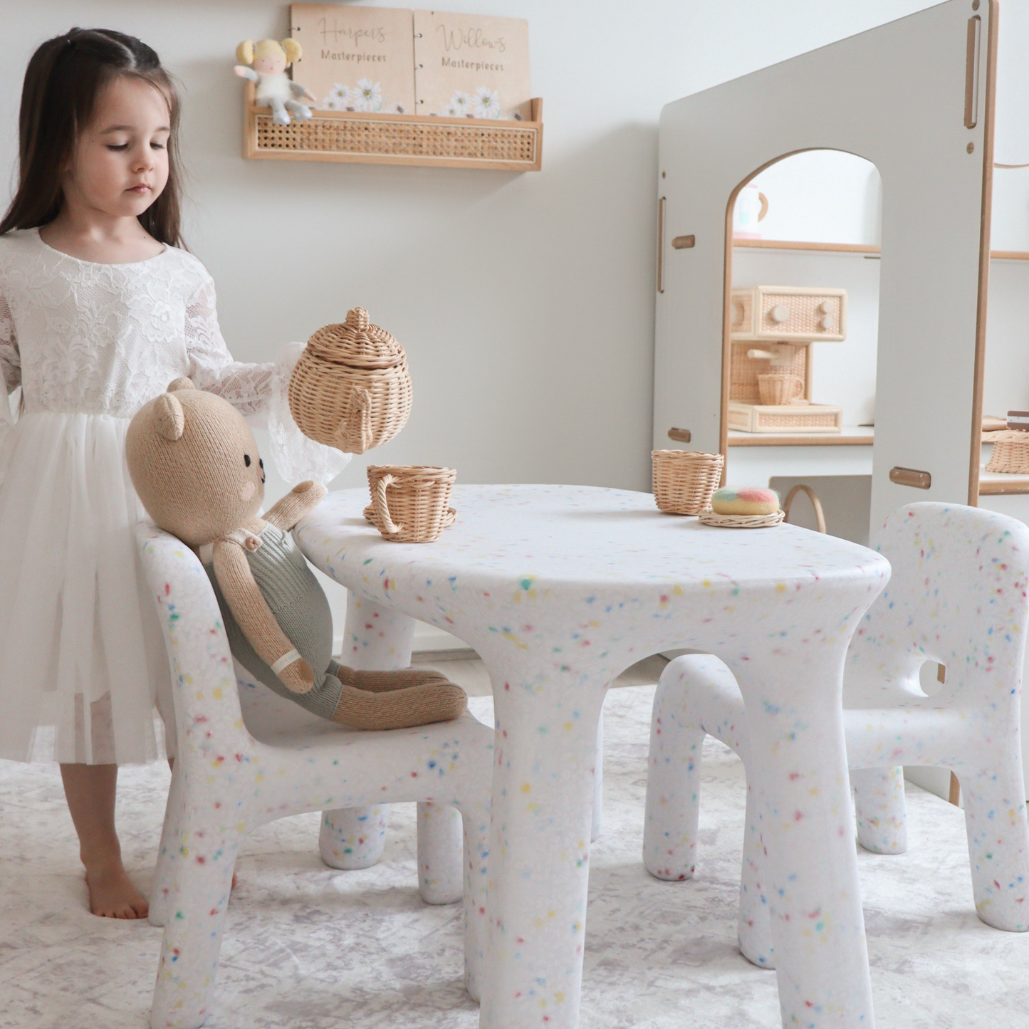 white speckles confetti set with girl playing tea party with her knitted bear